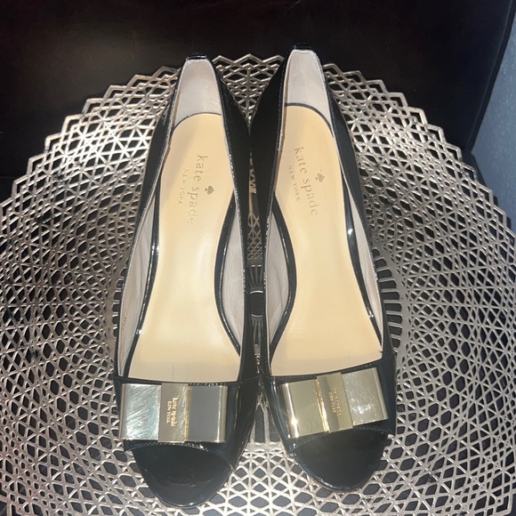 kate spade Shoes - kate spade Black Patent Peep-Toe Wedges with Gold Bow Accent